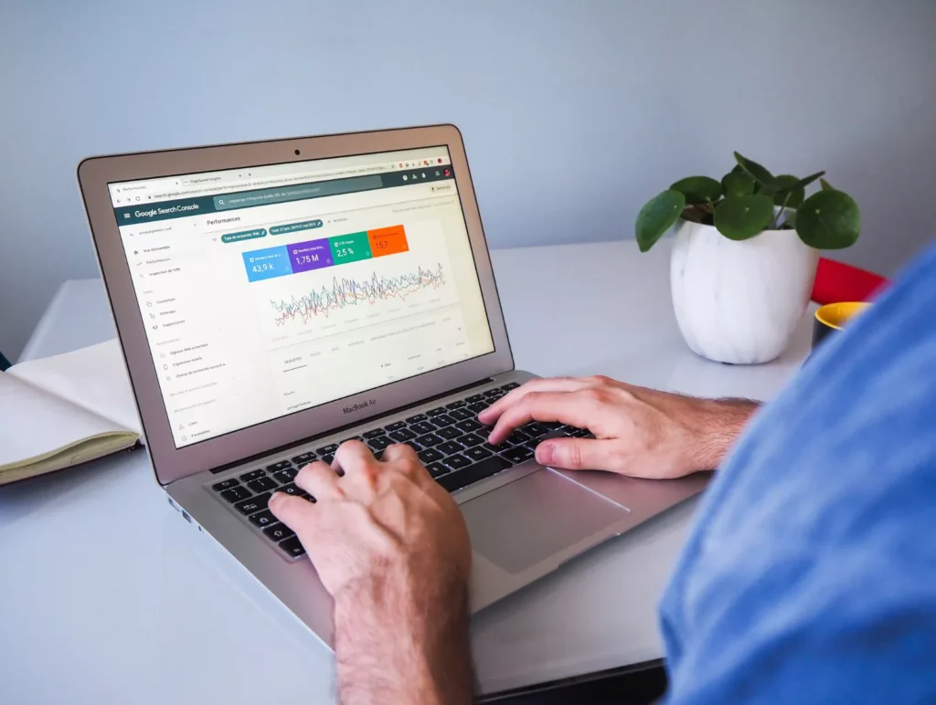 a doctor types on a computer
